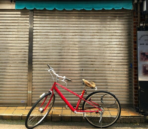 red and gray bicycle