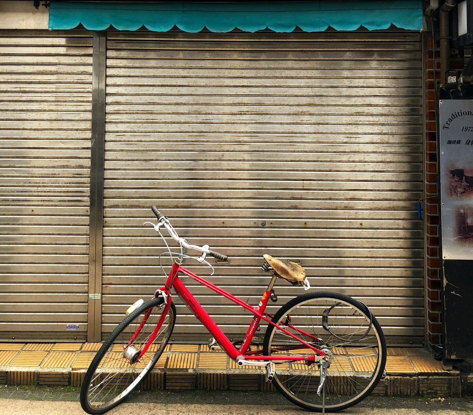 red and gray bicycle